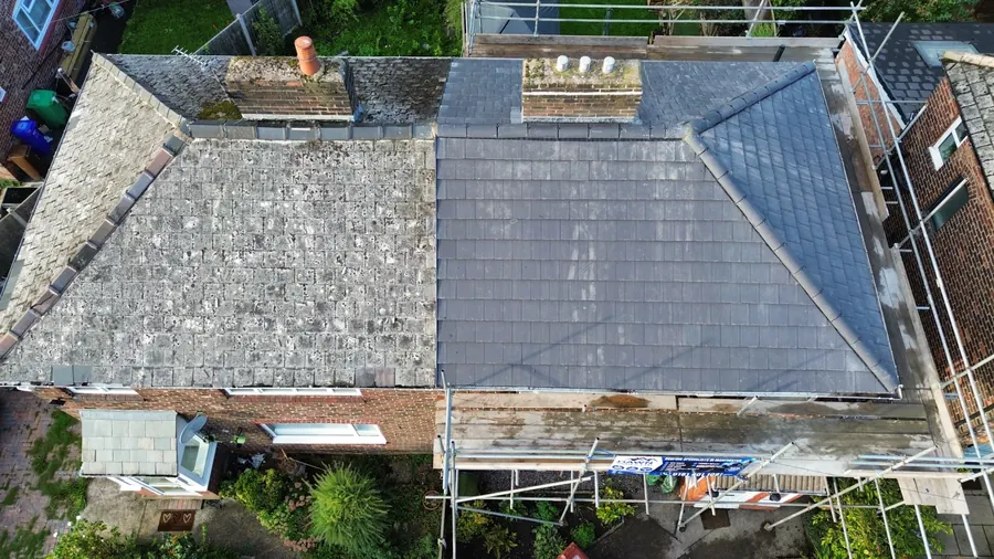 Drone view of a roof half old, half new, mid re-roof, Dawn Roofs Ltd