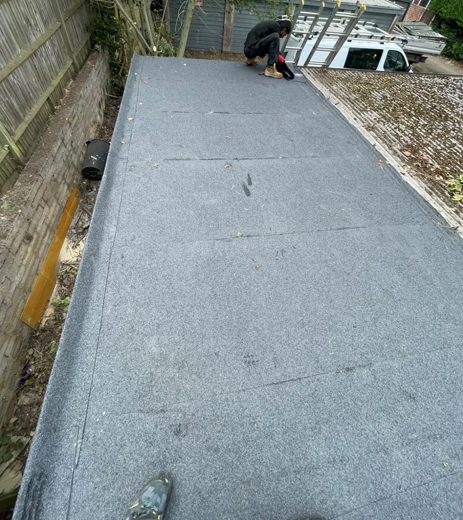 New felt flat roof on a long rear extension, Dawn Roofs Ltd