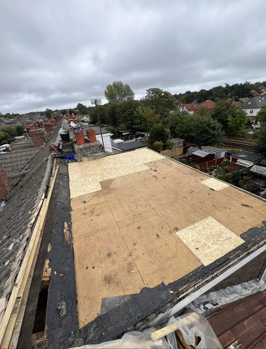 New timber deck boarded on a stripped flat roof, Dawn Roofs Ltd