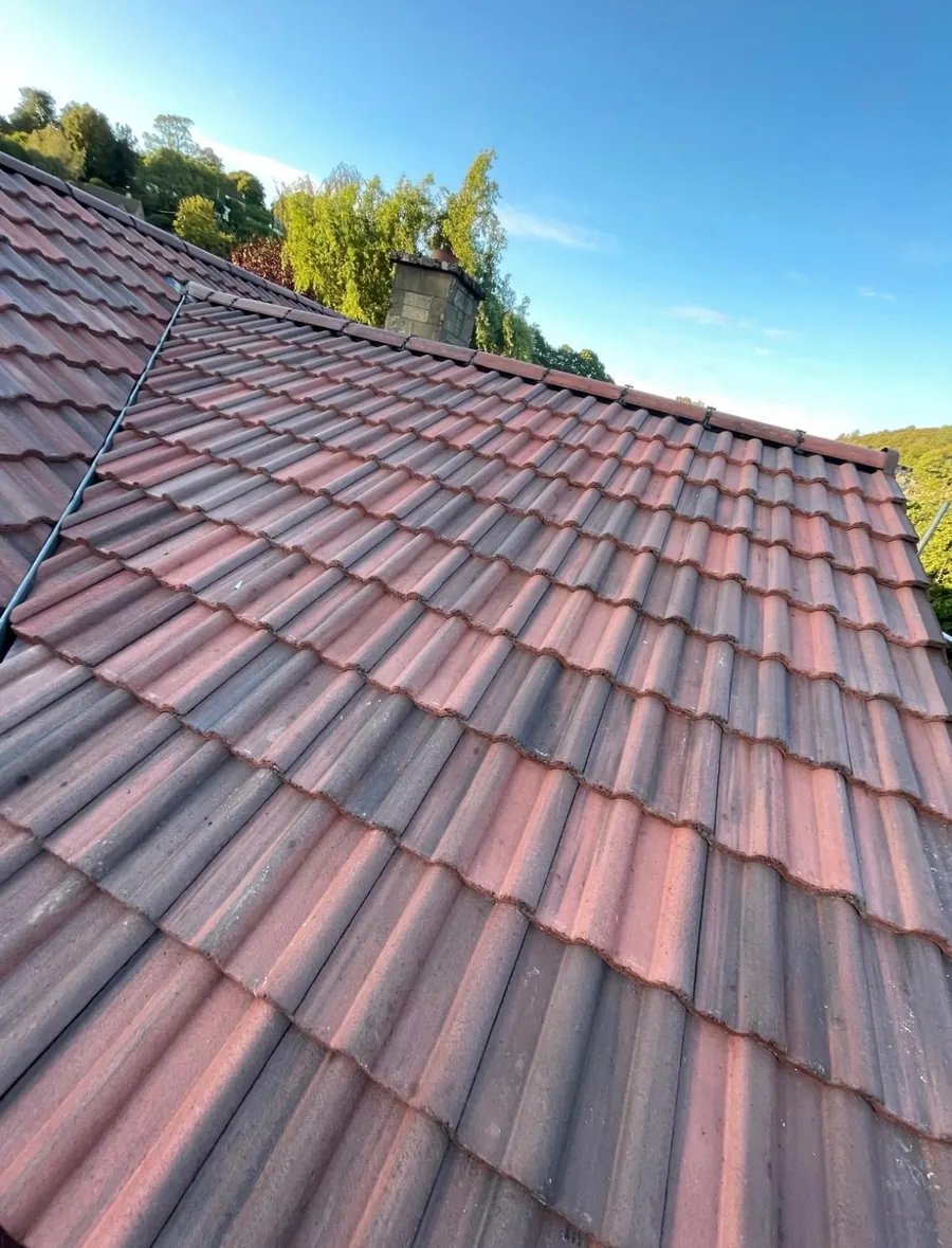 Close view of new red interlocking tiles, Dawn Roofs Ltd