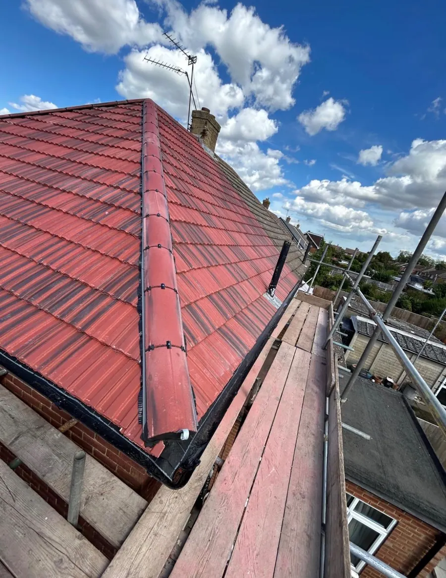 Red tile hip roof on a bungalow, finished, Dawn Roofs Ltd