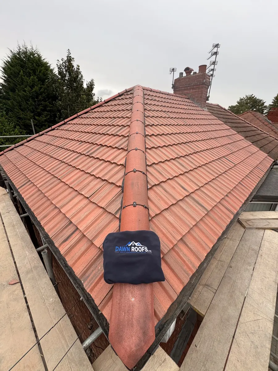 Red tile hip and ridge finished on a bungalow, Dawn Roofs Ltd