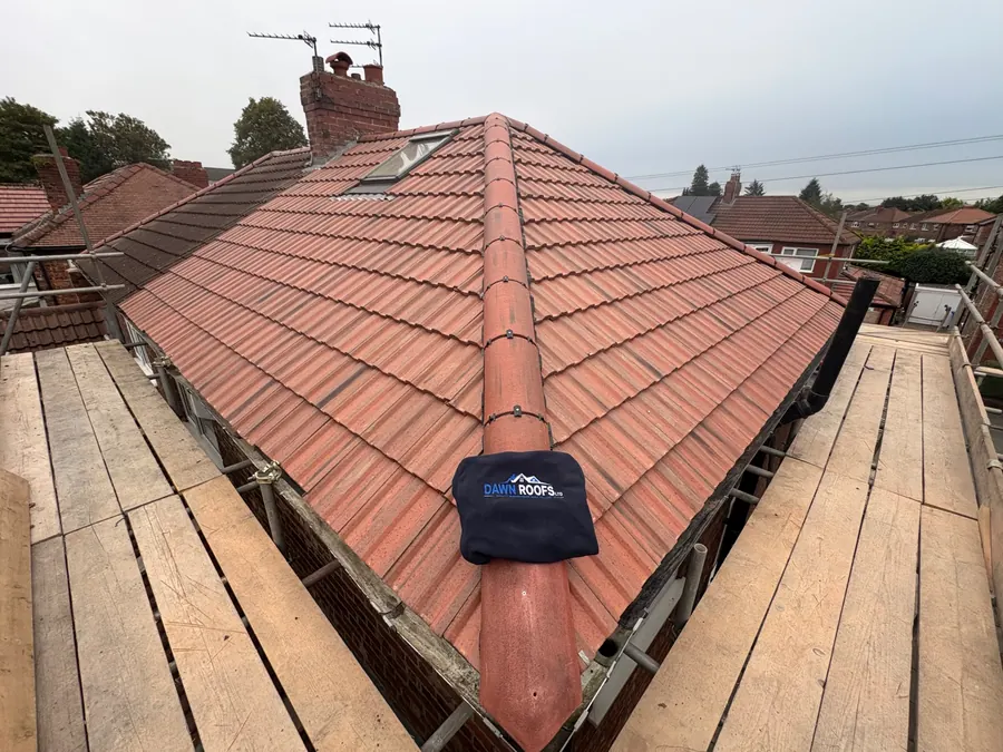 Red tile hip roof finished with the scaffold boards still up, Dawn Roofs Ltd