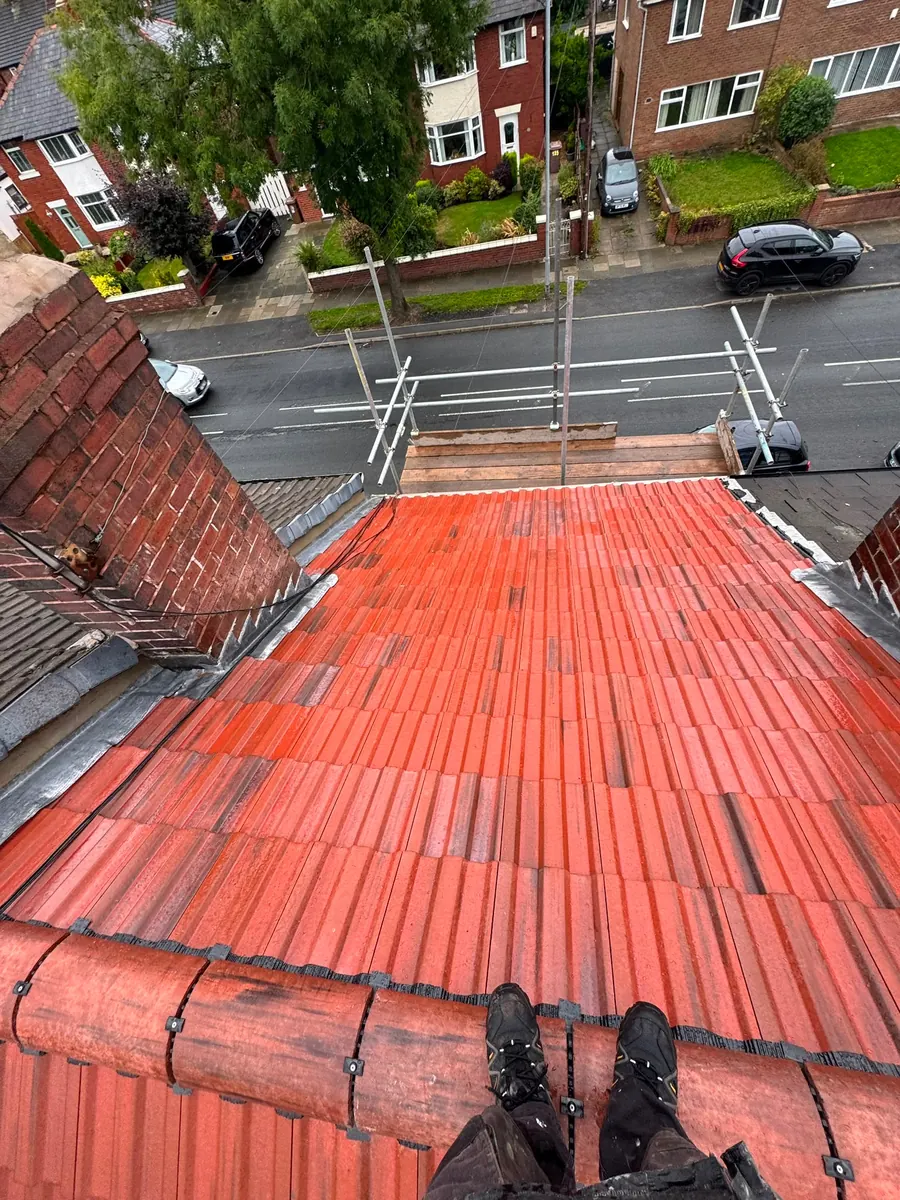 New red tile slope seen from the ridge, Dawn Roofs Ltd