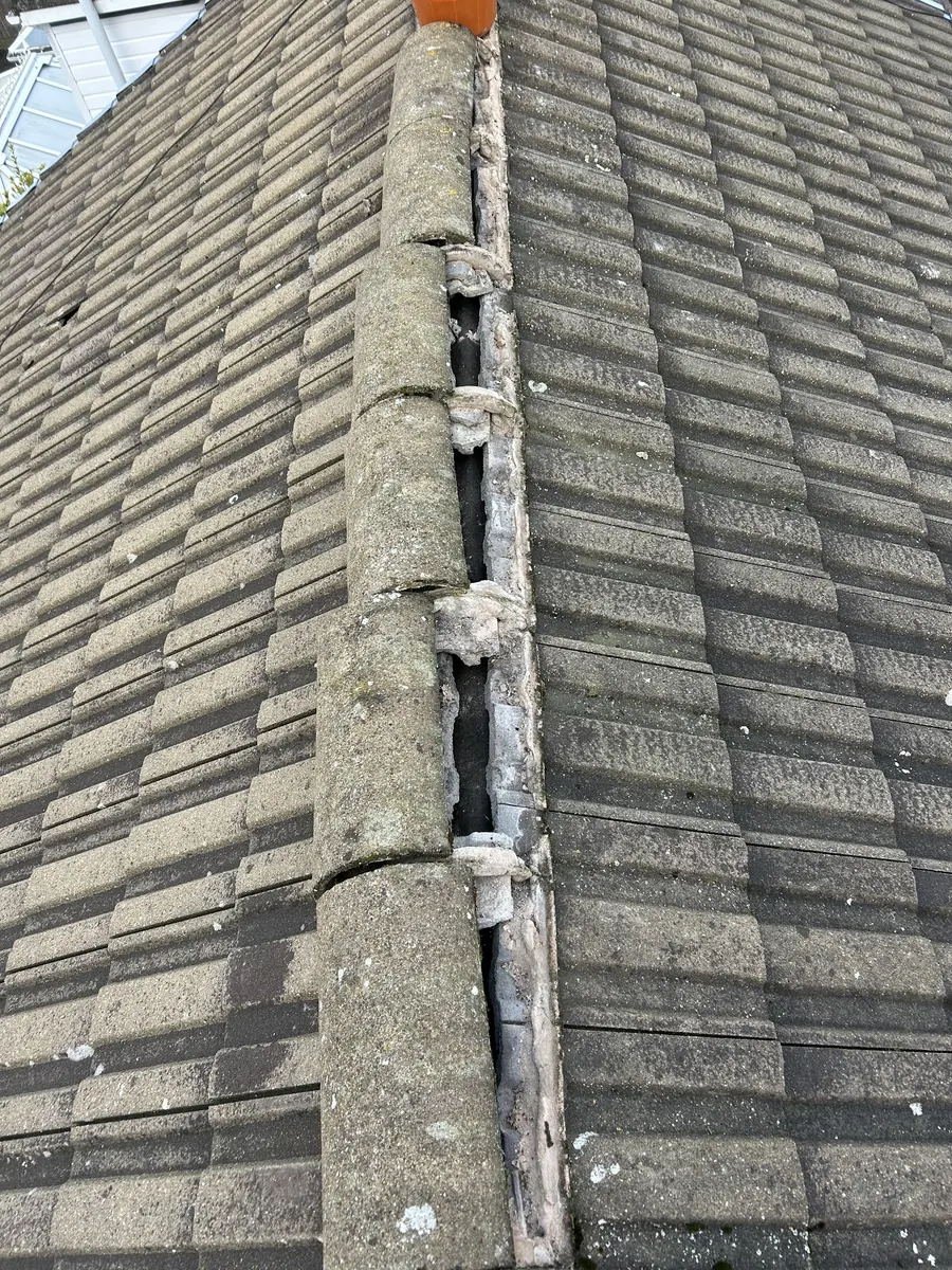 Old ridge with failing mortar, before repair, Dawn Roofs Ltd