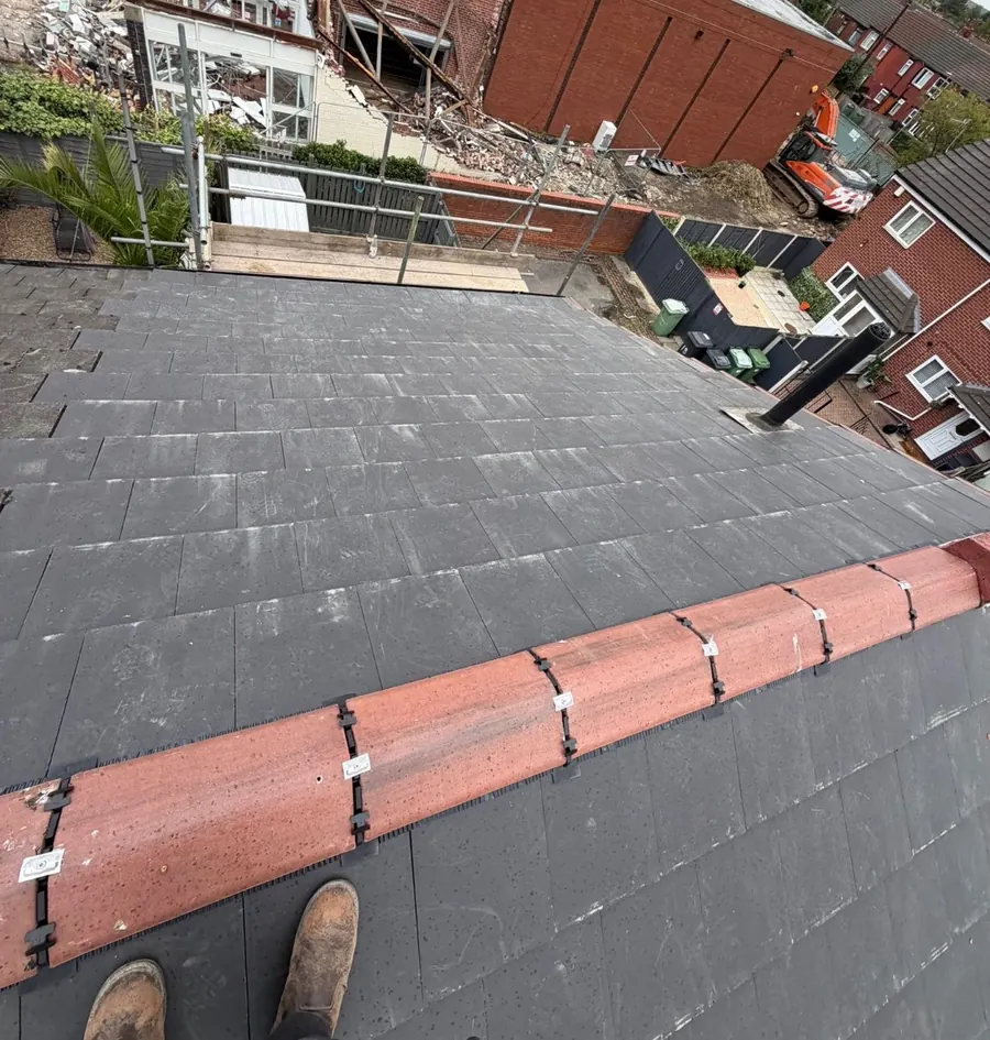 Ridge tiles laid out on a new slate roof, Dawn Roofs Ltd